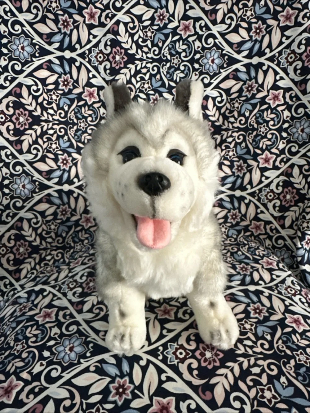 Siberian Husky dog toy with blue eyes and a happy open mouth showing its tongue
